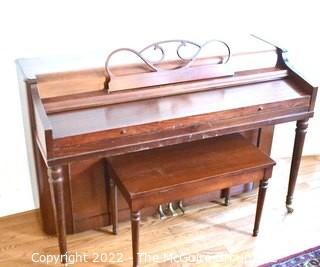 Jesse French & Sons Upright Piano with Bench.  Measures 23" x 37" x 57".  This item must be moved by buyer. 