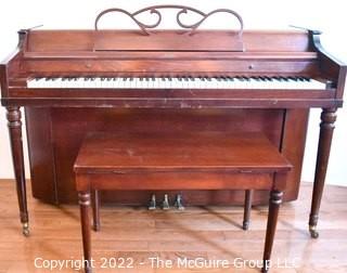 Jesse French & Sons Upright Piano with Bench.  Measures 23" x 37" x 57".  This item must be moved by buyer. 