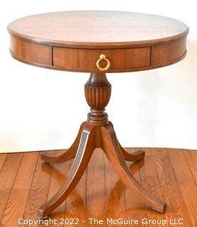 Mahogany Pedestal Single Drawer Four Leg Drum Table.  Measures 27" in diameter and 29" tall.