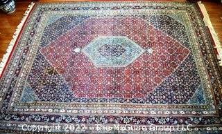 Vintage Traditional Hand Knotted Oriental Rug with Center Medallion and Border Design on Red Ground.  Measures 112" x 147".