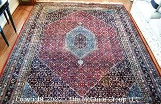 Vintage Traditional Hand Knotted Oriental Rug with Center Medallion and Border Design on Red Ground.  Measures 112" x 147".