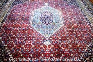 Vintage Traditional Hand Knotted Oriental Rug with Center Medallion and Border Design on Red Ground.  Measures 112" x 147".