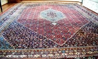 Vintage Traditional Hand Knotted Oriental Rug with Center Medallion and Border Design on Red Ground.  Measures 112" x 147".