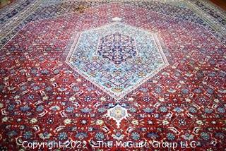 Vintage Traditional Hand Knotted Oriental Rug with Center Medallion and Border Design on Red Ground.  Measures 112" x 147".