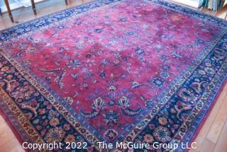 Vintage Persian Oriental Hand Knotted Rug with All Over Floral Design on Dark Red Base.  Measures 106" x 142".