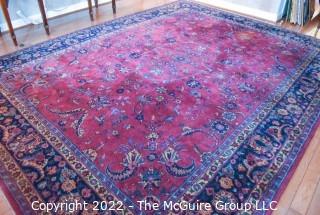 Vintage Persian Oriental Hand Knotted Rug with All Over Floral Design on Dark Red Base.  Measures 106" x 142".