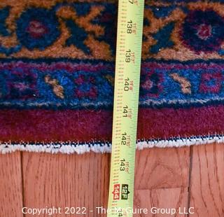 Vintage Persian Oriental Hand Knotted Rug with All Over Floral Design on Dark Red Base.  Measures 106" x 142".