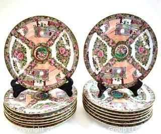 Set of Fourteen (14) Asian Incised Hand Painted Rose Medallion Porcelain Plates.  Each measure 10" in diameter.