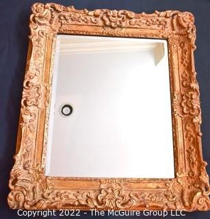 Ornate Gilt Framed Wall Mirror.  Measures 27" x 32".