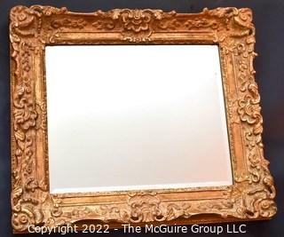 Ornate Gilt Framed Wall Mirror.  Measures 27" x 32".