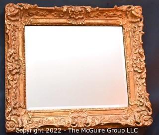 Ornate Gilt Framed Wall Mirror.  Measures 27" x 32".