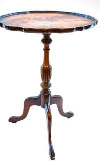 Chippendale Style Mahogany Pie Crust Three Leg Pedestal Table.  Measures 25" tall and 18" in diameter.