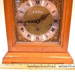 Seth Thomas Mantle Clock in Wood Case.  Measures 13" T.