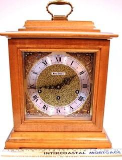 Seth Thomas Mantle Clock in Wood Case.  Measures 13" T.