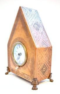 Embossed Leather Mantel Clock with Brass Feet.  Measures 10" tall.