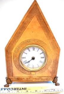 Embossed Leather Mantel Clock with Brass Feet.  Measures 10" tall.