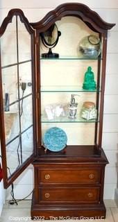 Victorian Glass Front Cabinet with Two Drawer Base.  Decorative items on shelves not included. 
 Measures 23" x 67".