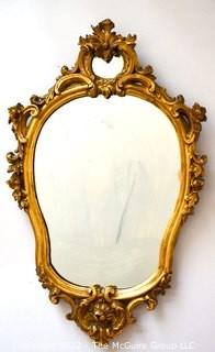 18th Century Rococo Style Carved Gilt Mirror.  Measures 18" x 28".