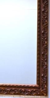 Ornate Framed Wall Mirror. Measures 26"x 38".