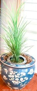 Large Asian Hand Painted on Blue Ground Porcelain Fish Bowl Planter with Faux Plant. Measures 12" Tall  x 14" Diameter.