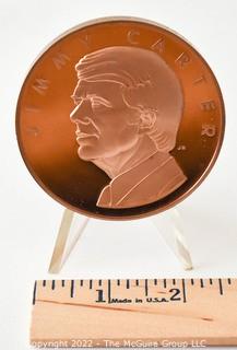 1971 Jimmy Carter Solid Bronze Commemorative Presidential Inaugural Coin Made by the Franklin Mint.  Measures 2 1/2" in diameter.