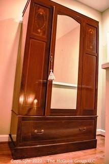 Antique Mahogany Armoire with Inlaid Satinwood, Ebony, Holly & Harwood Design. Beveled Mirror Door.  Two Pieces.  Measures 18 1/2" x 45"x 77".