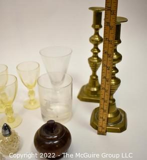 Antique Brass Push Up Candlesticks, Amber Depression Glass Cordials, Salt and Pepper Shakers and Wood Treenware Bowls.