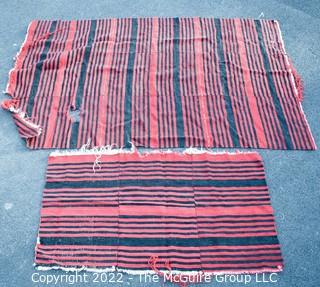 Vintage Peruvian Woven Red & Black Striped Blanket. Damage due to age.  Smaller blanket measures 32 x 58" Larger blanket measures 58 x 96"