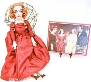 Artisan Made Bette Davis as  Margo Channing Doll in "All About Eve" with Framed Lobby Card from Movie. Signed by artist but signature illegible.  Includes wire chair. Measures 28" long.  Last photo shows Bette holding this doll.