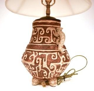 Ceramic Asian Themed Table Lamp. Measures 25"T x 10"W with shade.