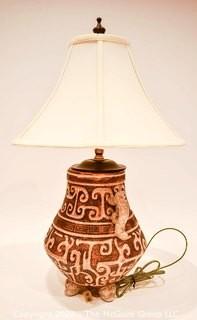 Ceramic Asian Themed Table Lamp. Measures 25"T x 10"W with shade.