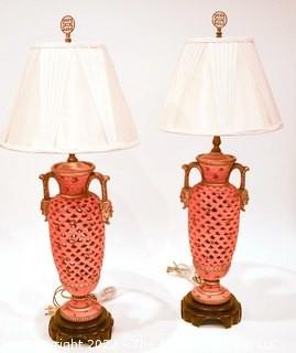 Pair of Asian Inspired Red Pierced Porcelain Table Lamps with Shades. Each measures 27" with shade.