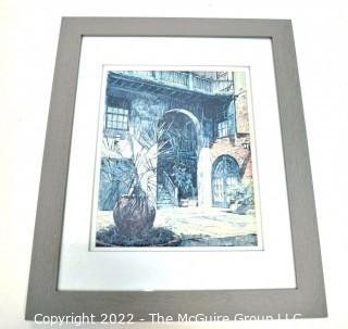 Framed Under Glass Print of Courtyard Scene.  Measures 13" x 16".