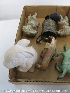 Collection including pair of cherubs, composition rabbit, and metal horse 