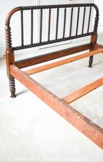 Antique Jenny Lind Full Sized Spindle Wood Bed Frame. Includes headboard, foot board, side rails and wood slats.  Some spindles are loose. (53"W x 79"L x 42 1/2"T.  0067LW