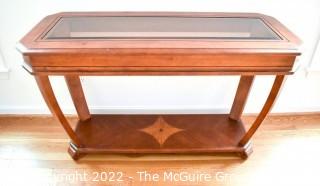 Contemporary Glass Insert Console Table with Marquetry Medallion on Lower Shelf.  Measures 20" W x 49"L x 30"T.