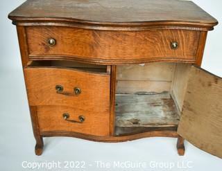 Antique Tiger Oak Veneer Bow Front Serpentine Washstand. Some damage to veneer on top.  Measures 34W x 17D x 30"T