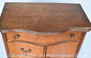 Antique Tiger Oak Veneer Bow Front Serpentine Washstand. Some damage to veneer on top.  Measures 34W x 17D x 30"T