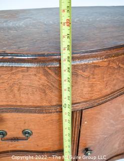 Antique Tiger Oak Veneer Bow Front Serpentine Washstand. Some damage to veneer on top.  Measures 34W x 17D x 30"T