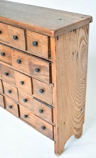 Antique 25 Drawer Wood Apothecary Chest or Cabinet.  Board on Back loose. Measures 7" x 20" x 19". 0095SM