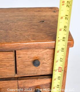 Antique 25 Drawer Wood Apothecary Chest or Cabinet.  Board on Back loose. Measures 7" x 20" x 19". 0095SM