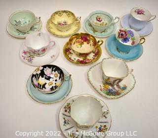 Collection of Fine Porcelain Hand Painted Tea Cups and Saucers. 