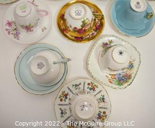 Collection of Fine Porcelain Hand Painted Tea Cups and Saucers. 