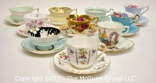 Collection of Fine Porcelain Hand Painted Tea Cups and Saucers. 