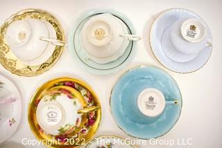 Collection of Fine Porcelain Hand Painted Tea Cups and Saucers. 