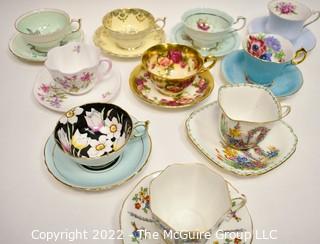 Collection of Fine Porcelain Hand Painted Tea Cups and Saucers. 