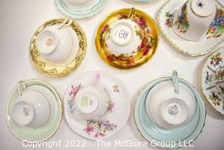 Collection of Fine Porcelain Hand Painted Tea Cups and Saucers. 