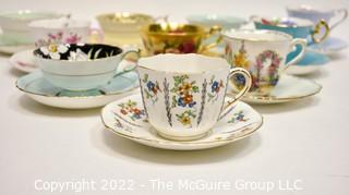 Collection of Fine Porcelain Hand Painted Tea Cups and Saucers. 