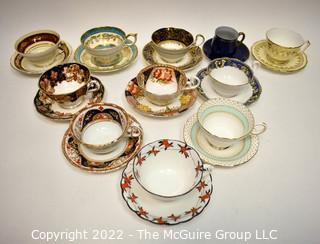 Collection of Fine Porcelain Hand Painted Tea Cups and Saucers. 