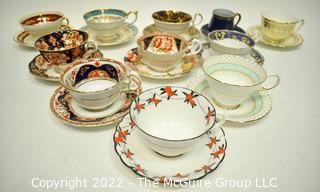 Collection of Fine Porcelain Hand Painted Tea Cups and Saucers. 